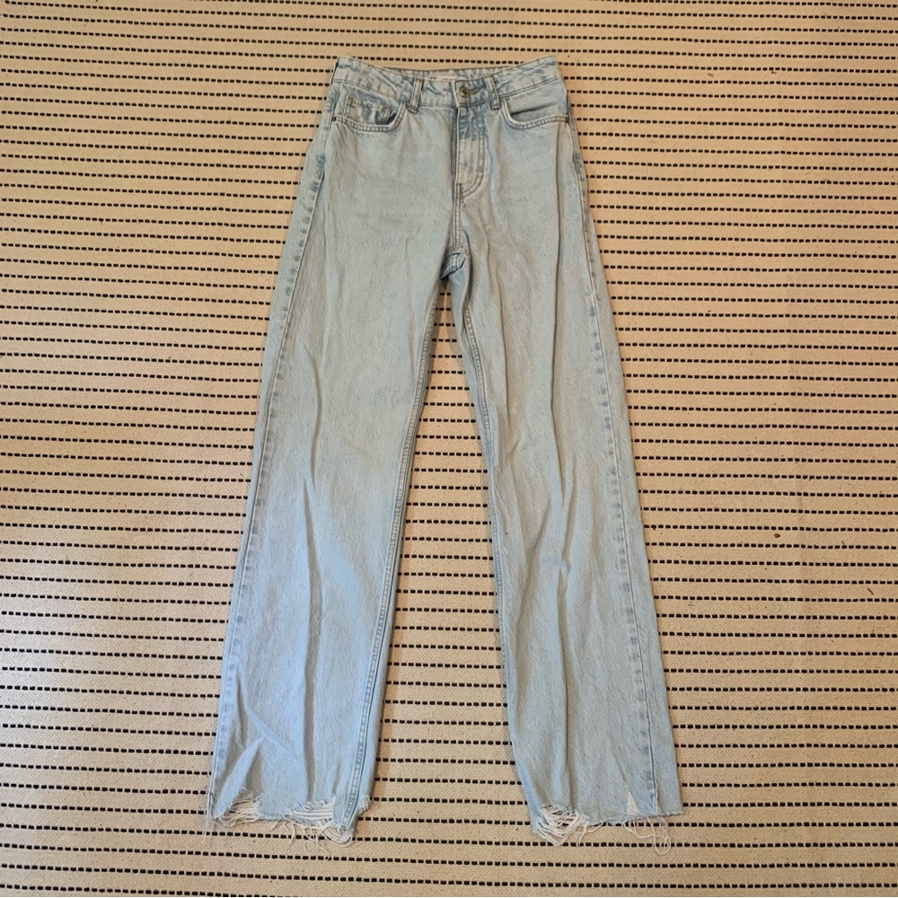 Light Blue Straight Jeans with Ripped Hem